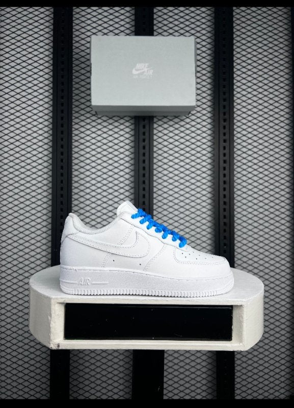 Cup-sole white leather low-top with blue laces