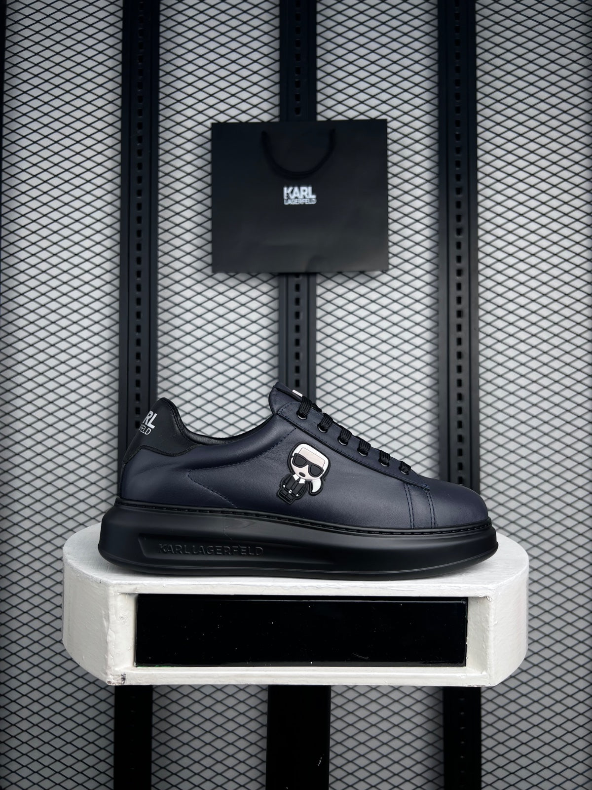 Cartoon-patch dark navy leather chunky platform sneaker