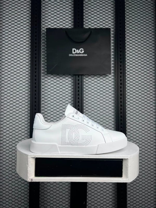 Perforated leather low-top in white on a cup sole with a luxury finish