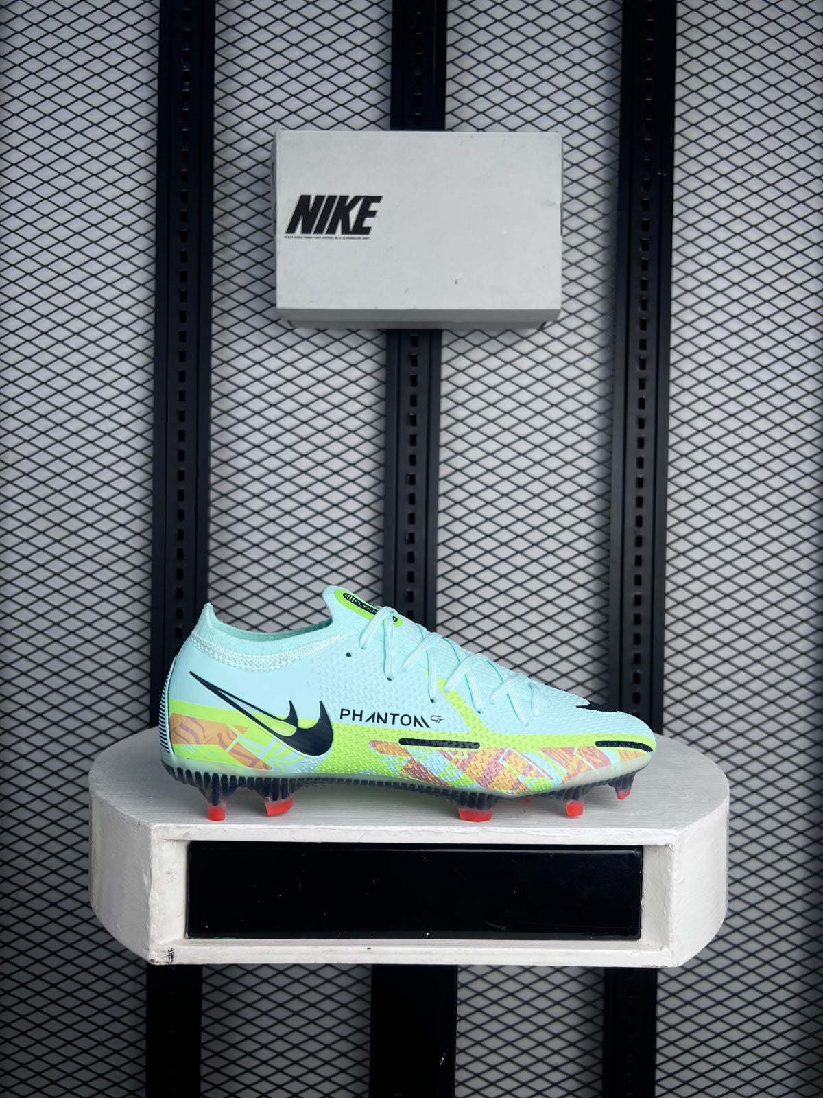 Abstract-print knit football boot in light mint