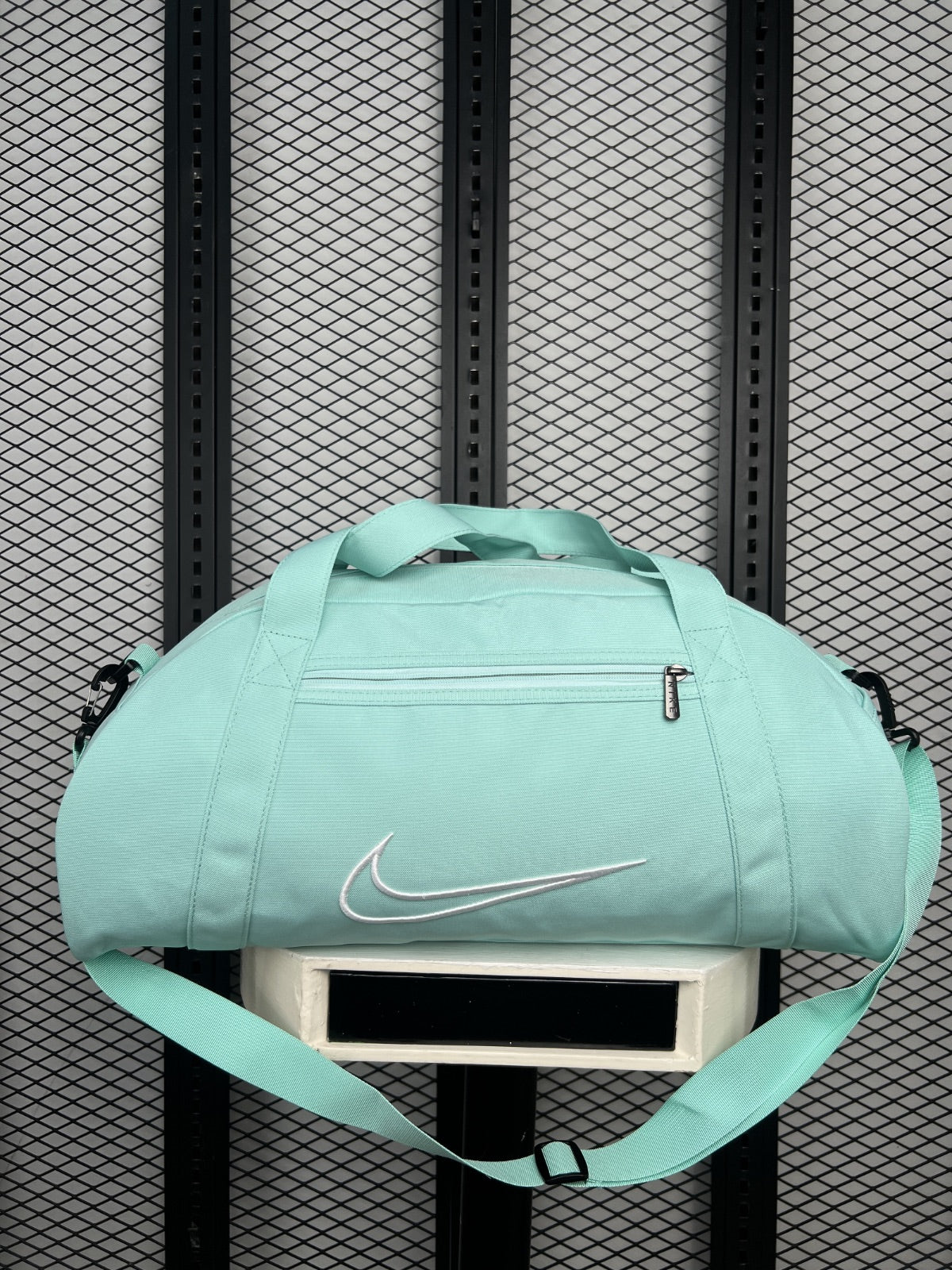 Embroidered-outline canvas duffel bag in mint green