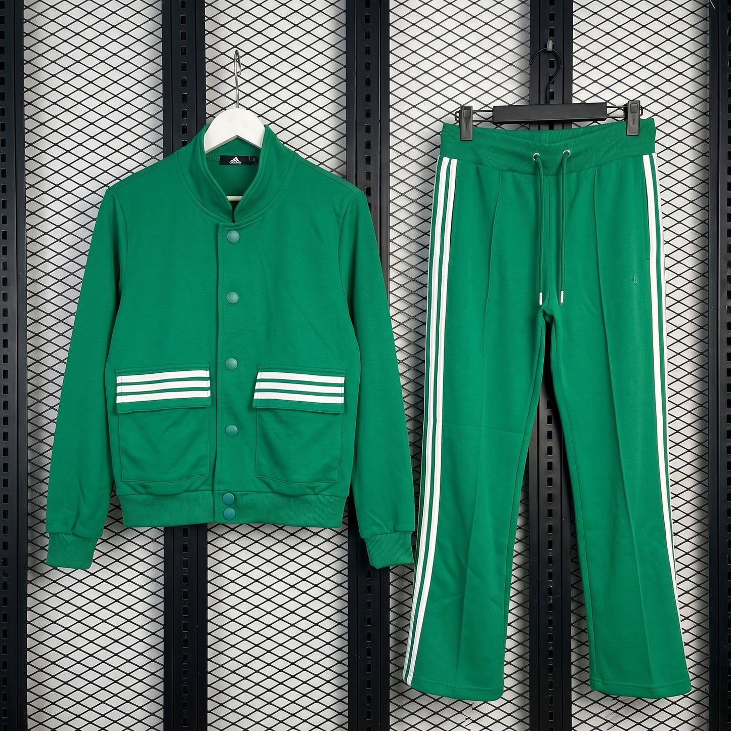 Three-stripe green track jacket and flared pant set