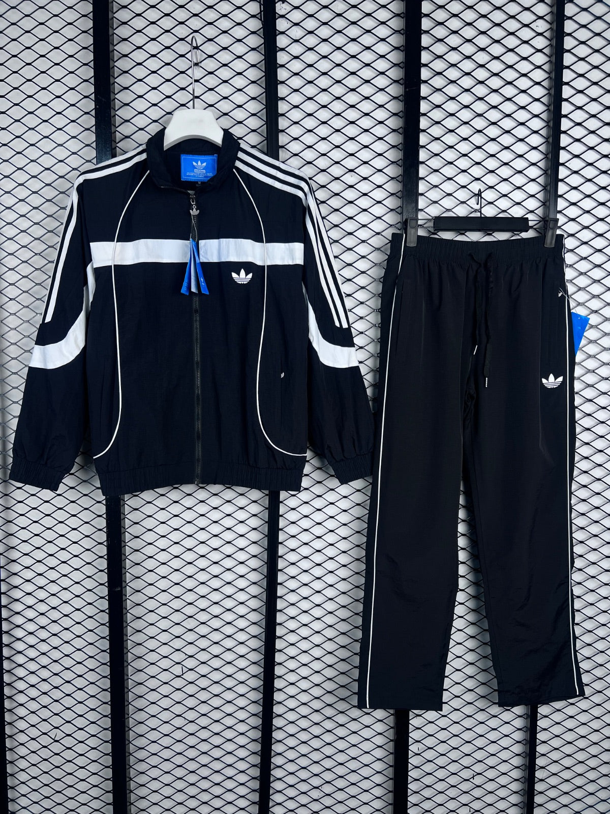 Contrast-piped nylon tracksuit in black and white