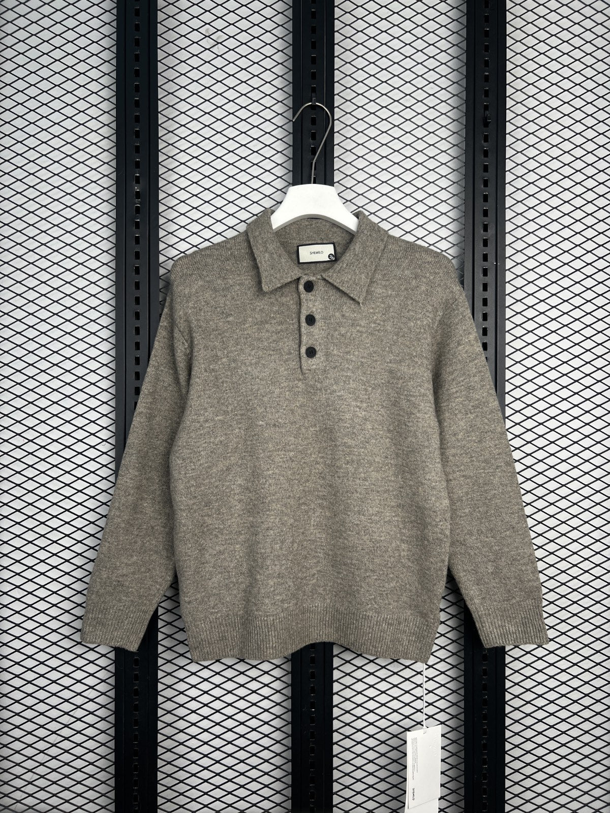 Henley-collar knit sweater in heathered taupe