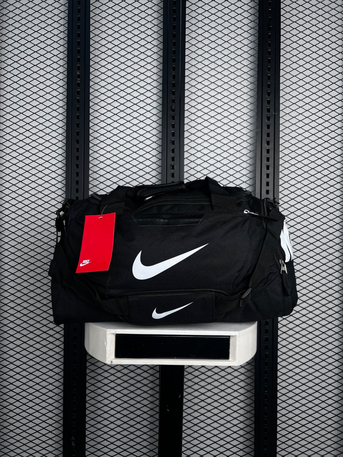 Dual-handle zip-top duffle bag in black canvas