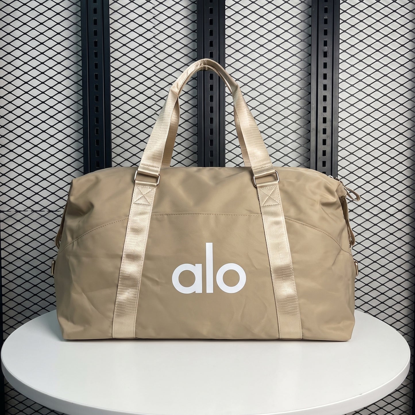 Duffle silhouette nylon bag in glossy beige
