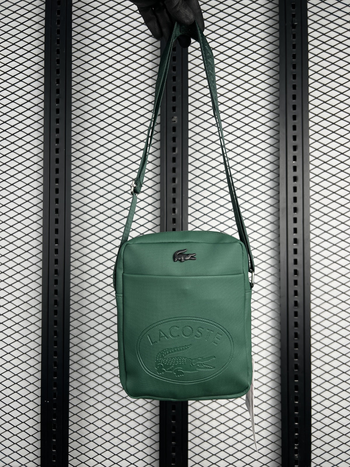 Coated canvas shoulder pouch in dark green