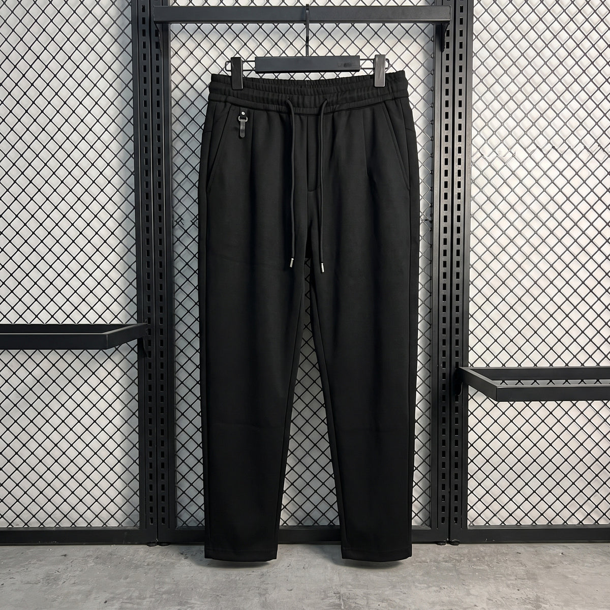 Elastic-waist tailored joggers in solid black
