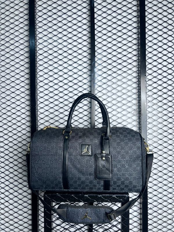 Gold-tone hardware monogram print textured duffel bag