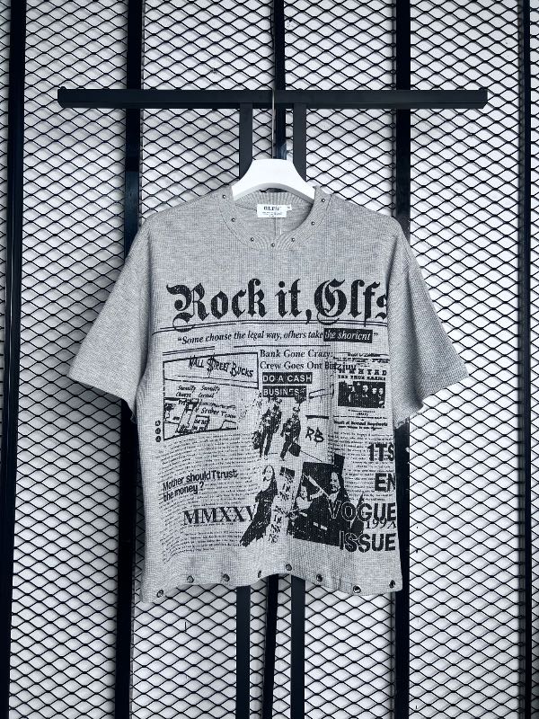 Oversized thermal knit tee with newspaper graphic print