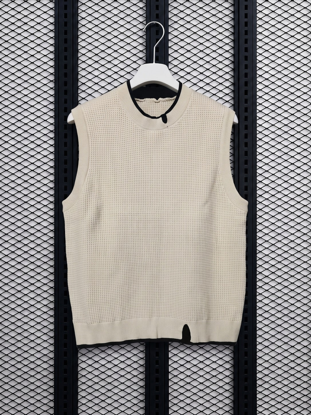 Textured knit crewneck sweater vest in cream