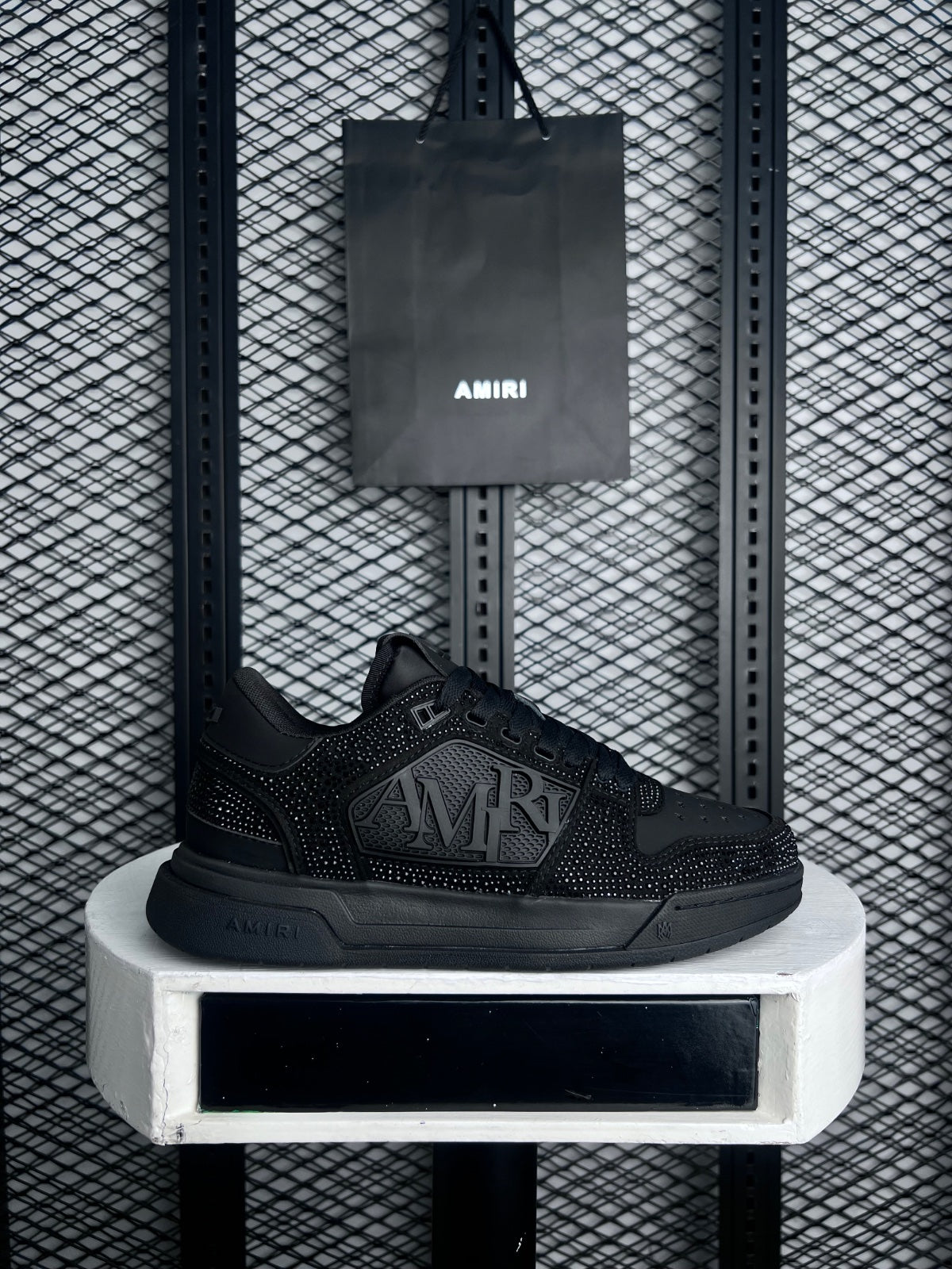 Textured coated low-top in black with luxury, skate, casual styling