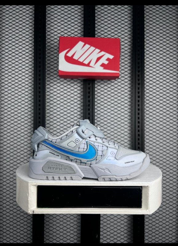 Grey futuristic low-top with bright blue side accents