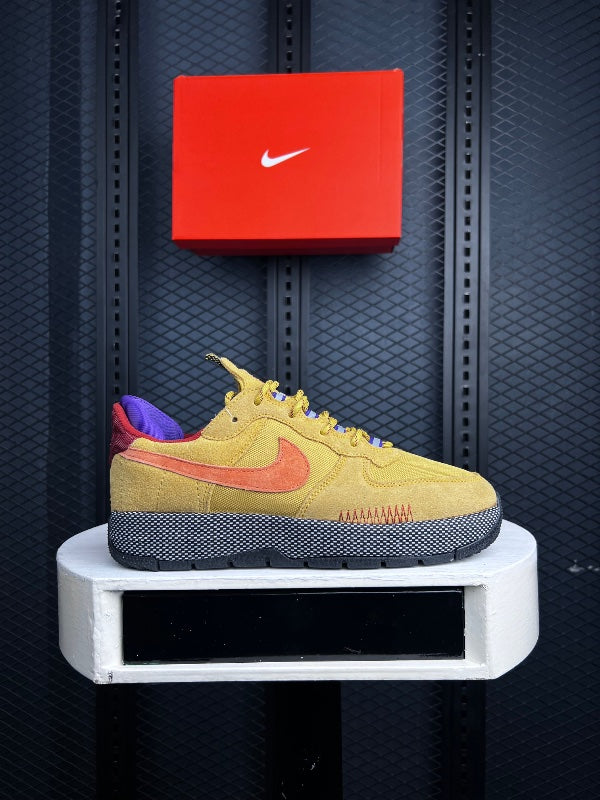 Grid-textured midsole trainer in mustard and orange