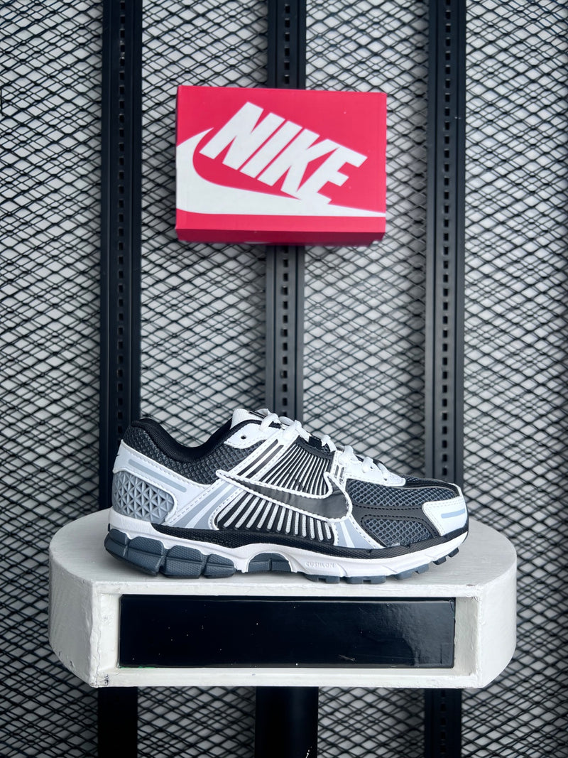 Open-mesh runner with caged overlays in slate and white