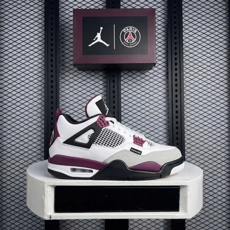 Bordeaux-accented layered leather mid-top with mesh panels