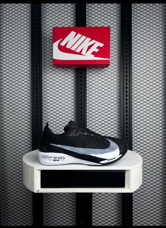 Textured knit runner in black and white on a rocker sole