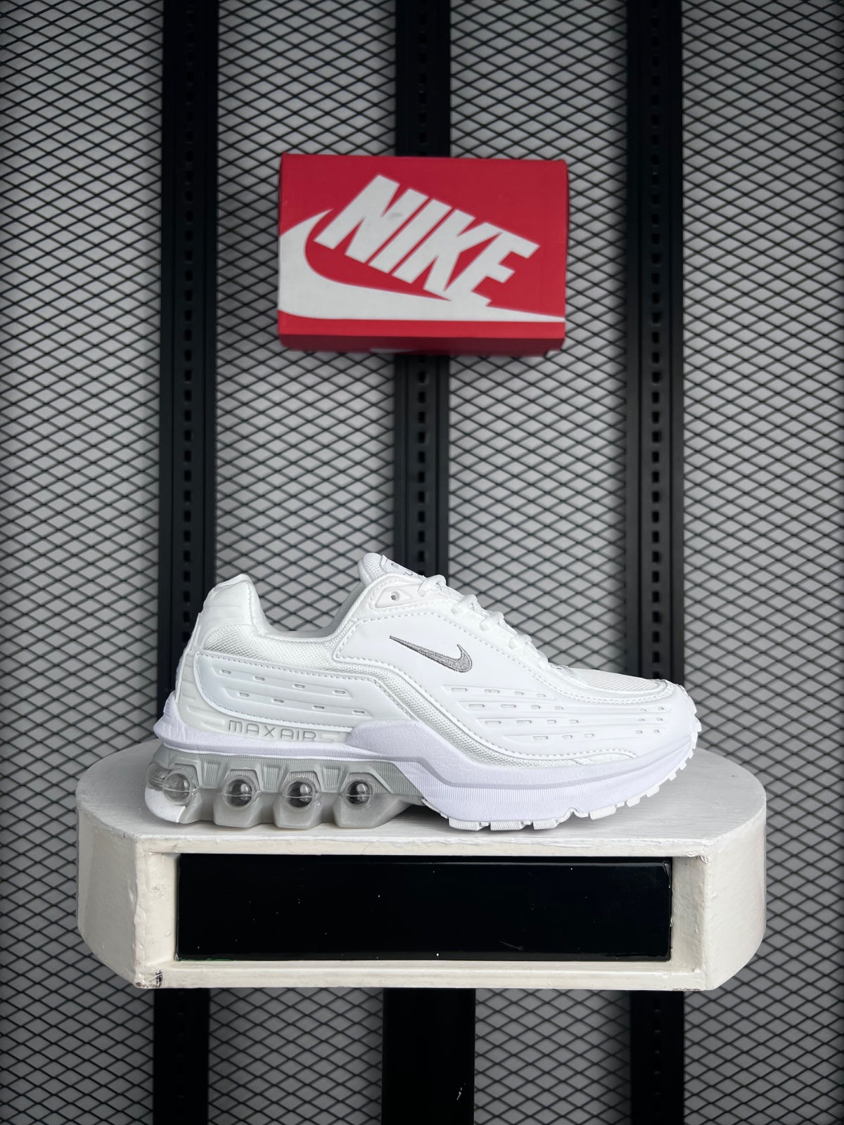 Low-top runner silhouette in cream with segmented sole