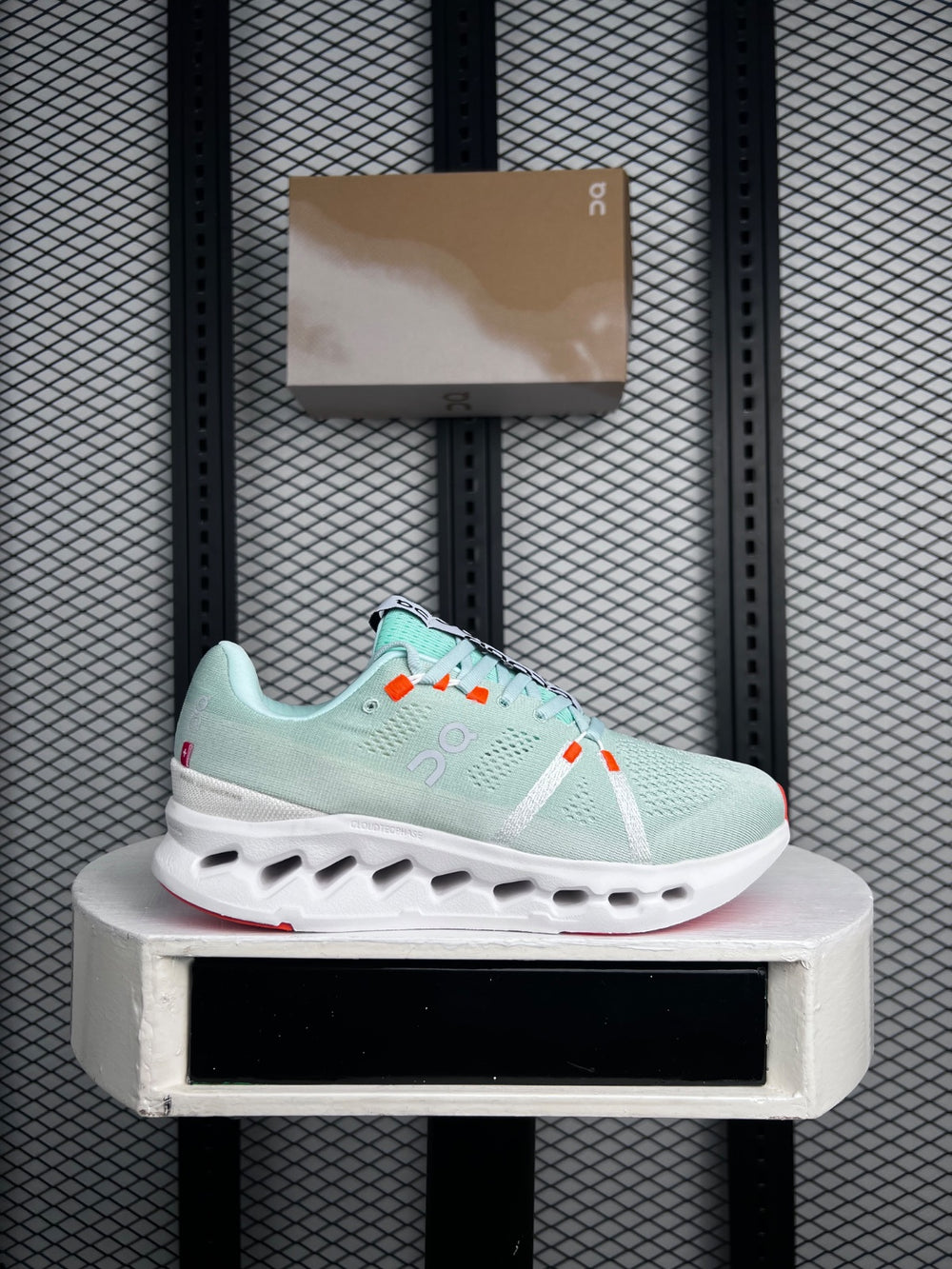 Textured mesh runner in mint and coral