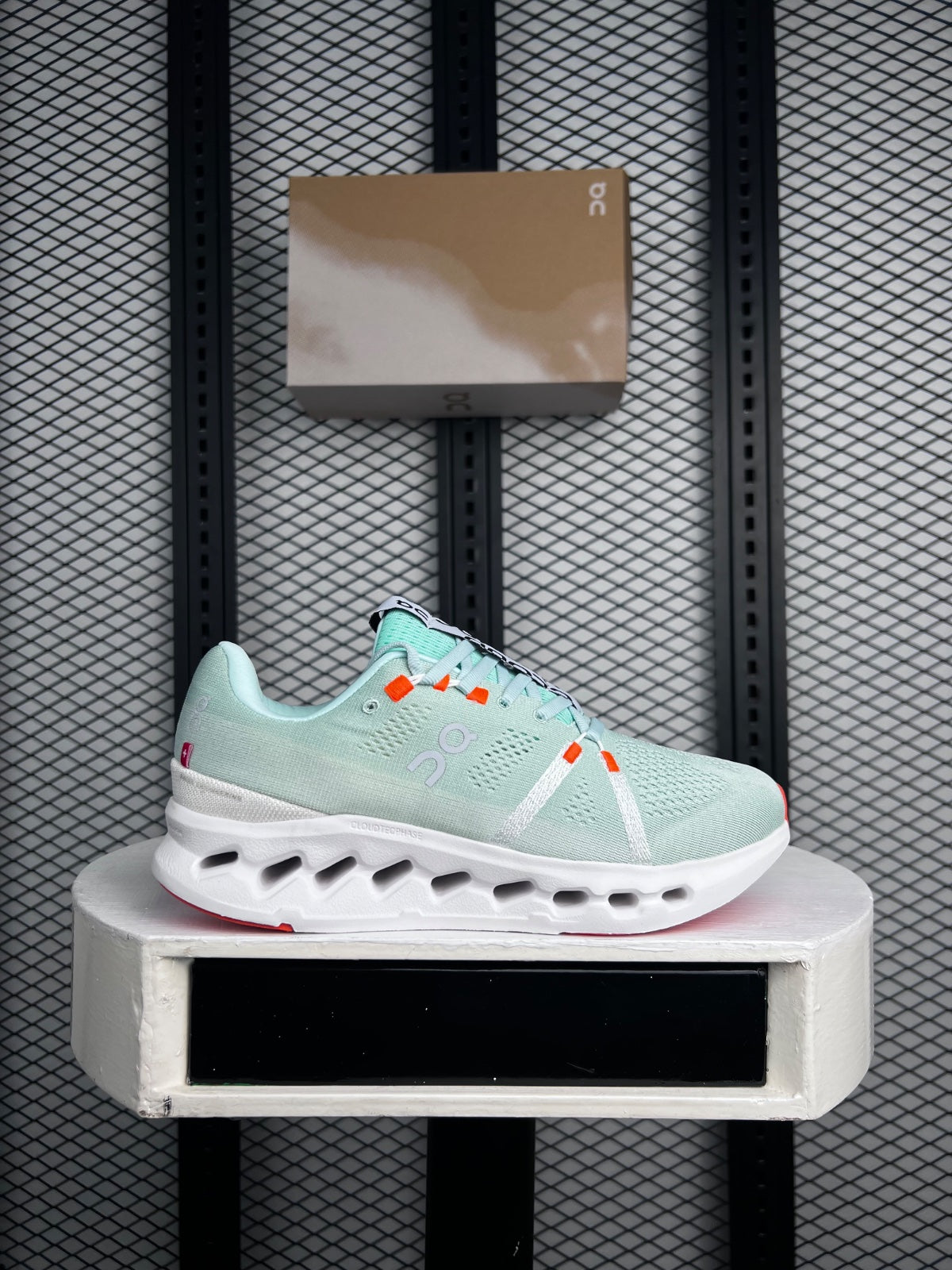 Textured mesh runner in mint and coral