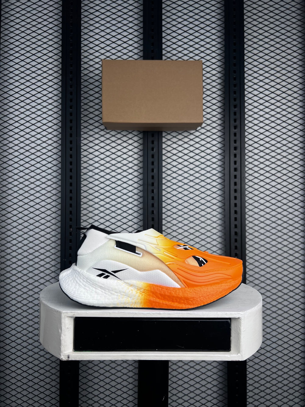 Molded-shroud slip-on runner in orange gradient