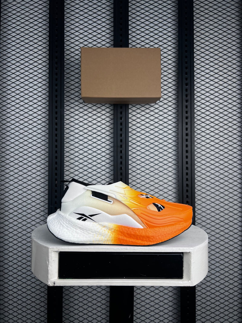 Molded-shroud slip-on runner in orange gradient