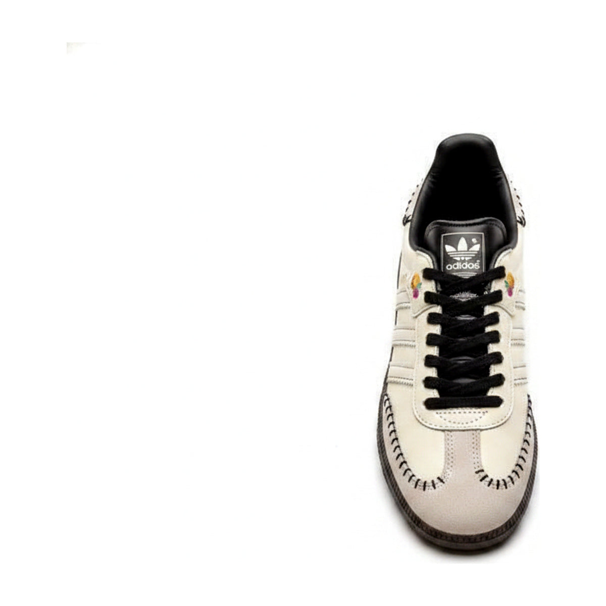 Contrast-stitched cream leather trainer with dark gum sole