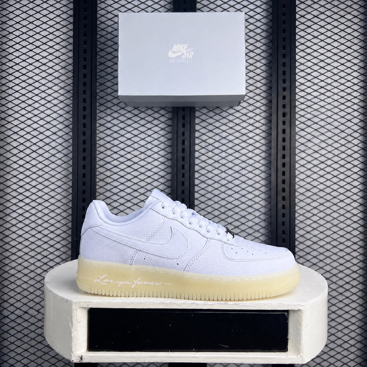 White tumbled leather low-top with script midsole detail