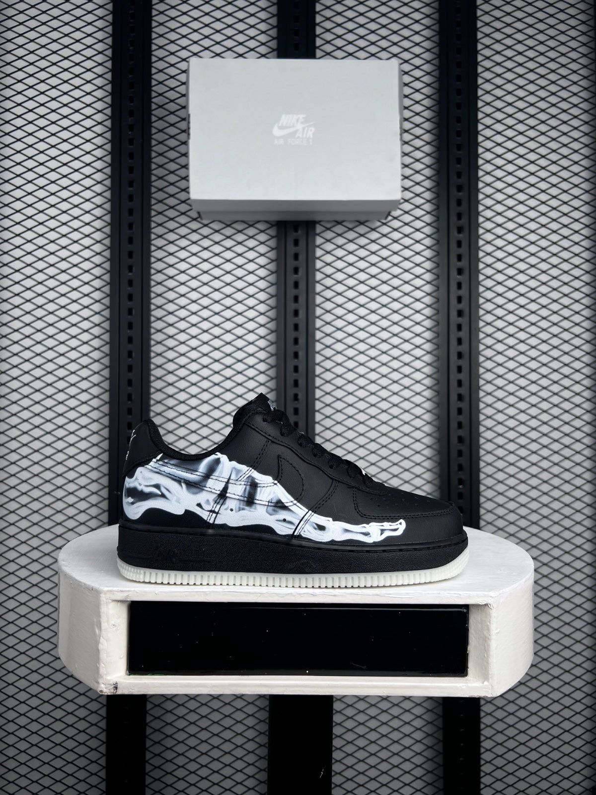 Printed leather low-top in black and white with a basketball finish