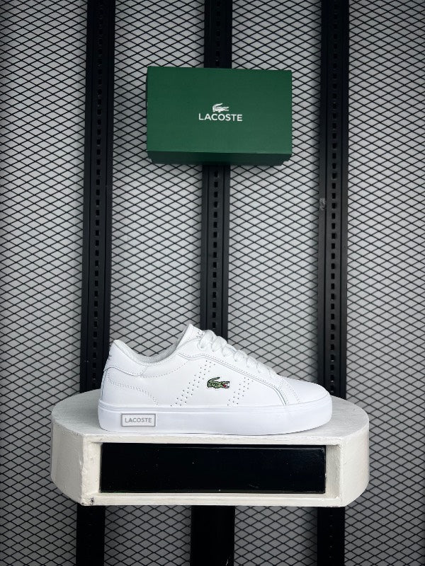 Perforated leather low-top in white on a platform sole