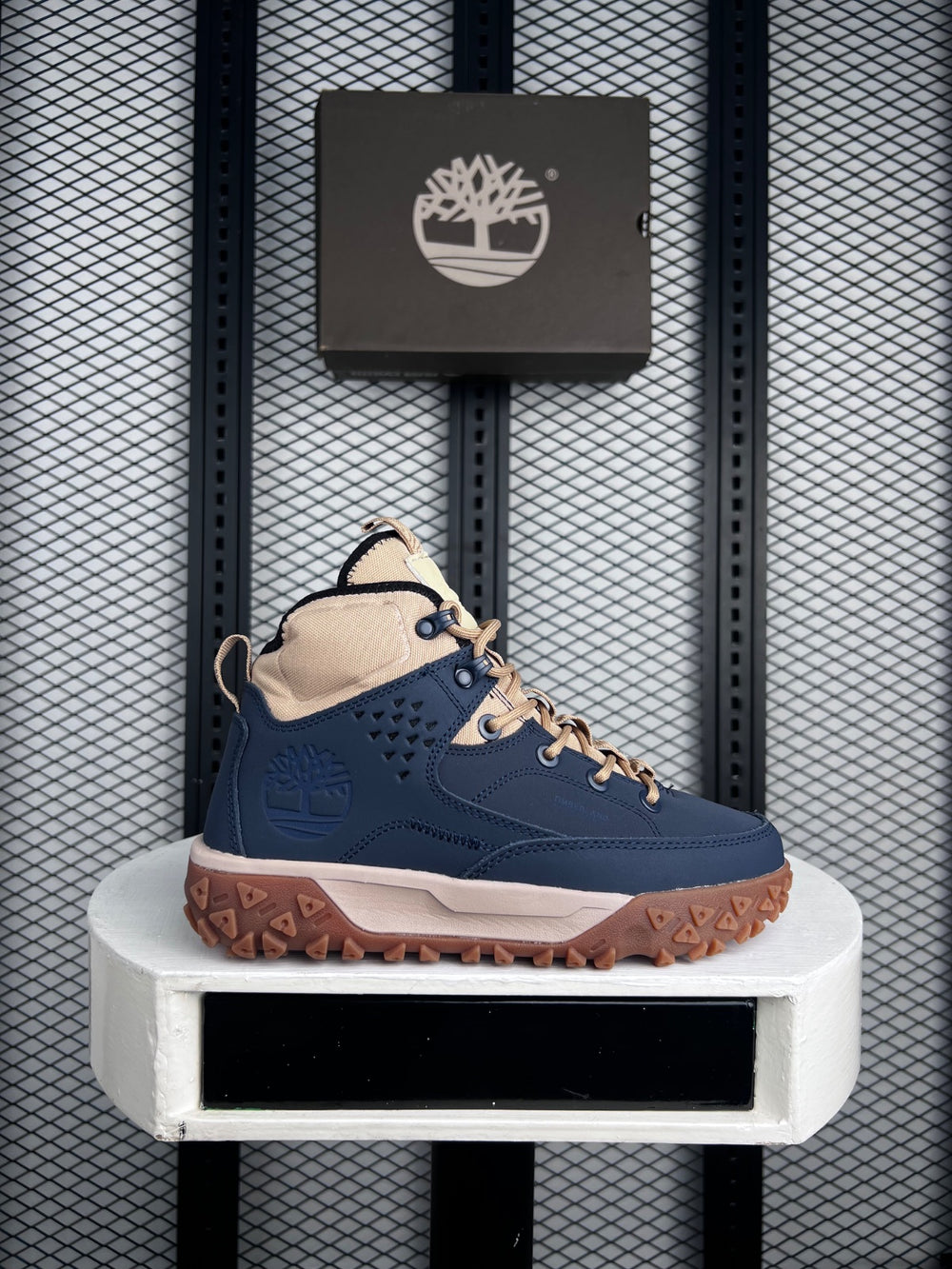Navy and tan mid-top hiker with gum sole