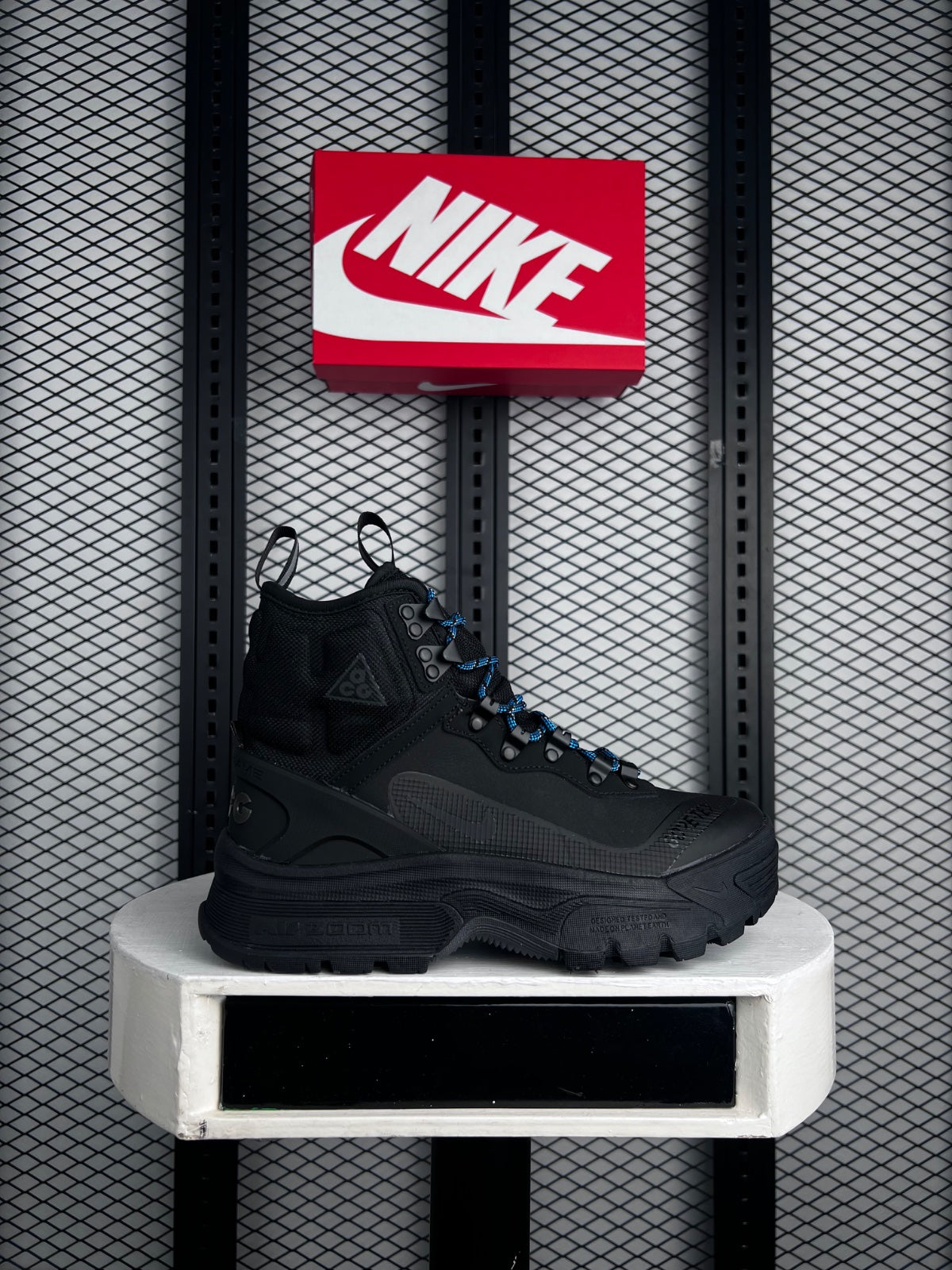Matte black waterproof hiking boot with lugged sole