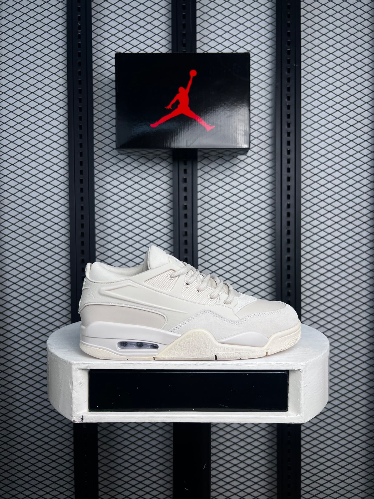 Cage-overlay low-top trainer in monochrome cream