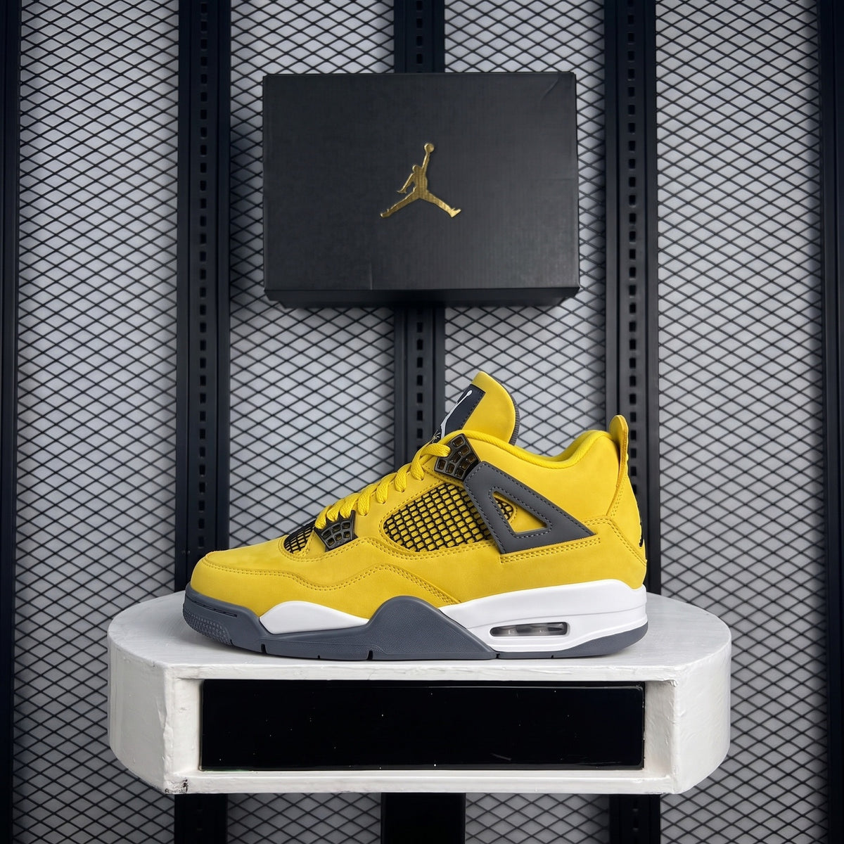 Bright yellow nubuck sneaker with dark grey support wings