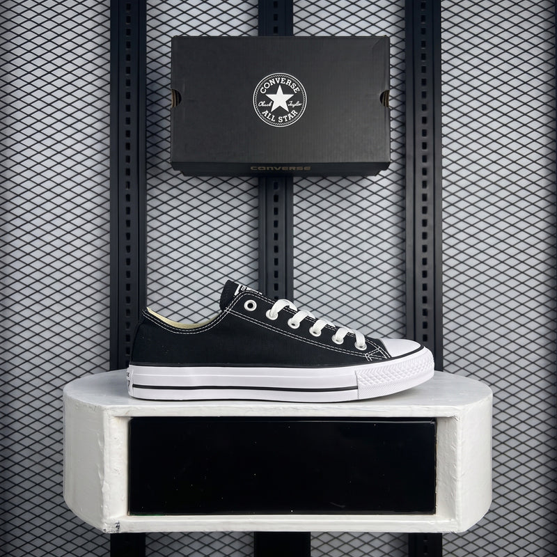 Black canvas low-top with cream rubber sole