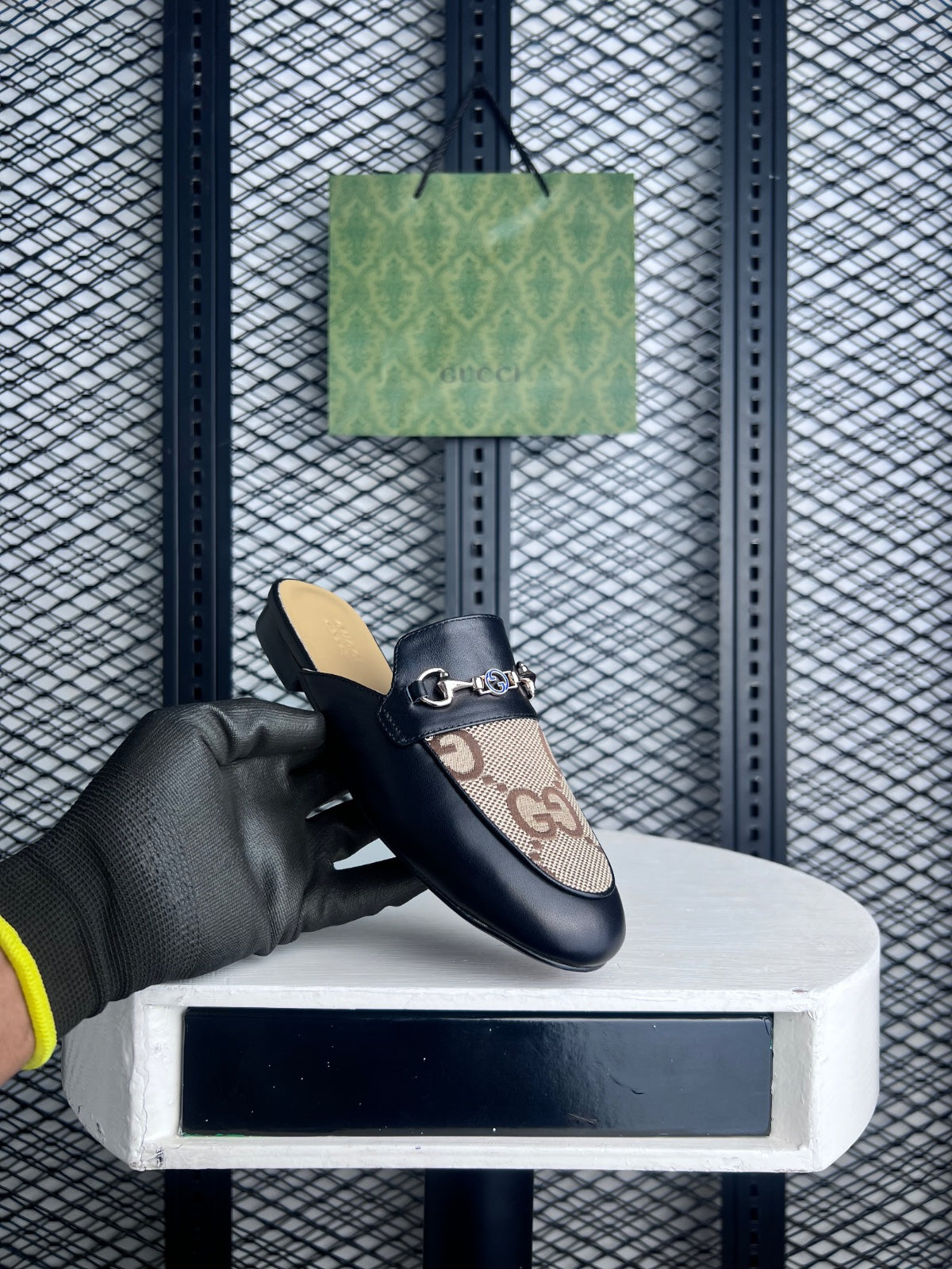 Smooth black leather mule with monogram canvas insert