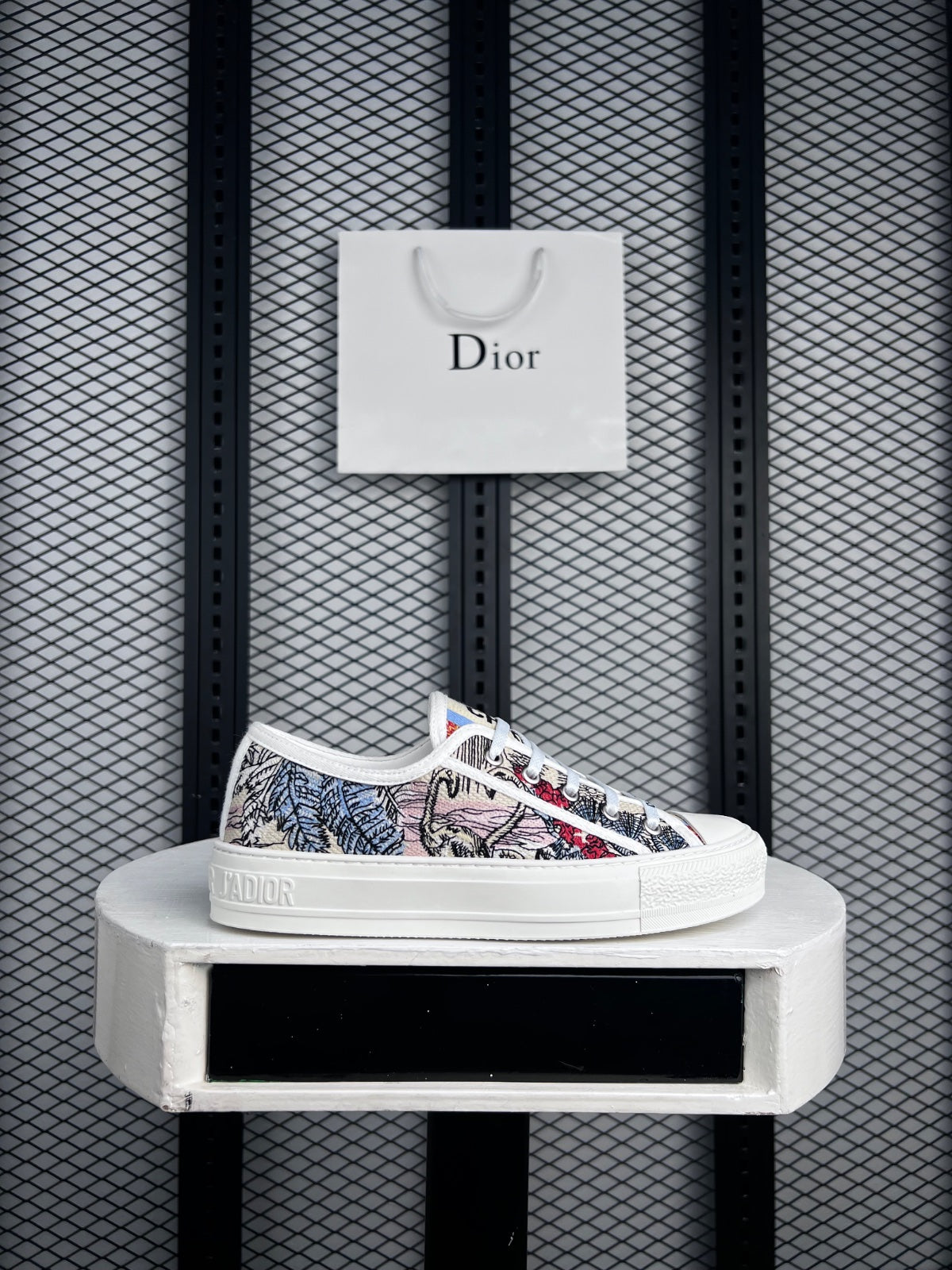 Embroidered tapestry low-top sneaker with textured platform sole