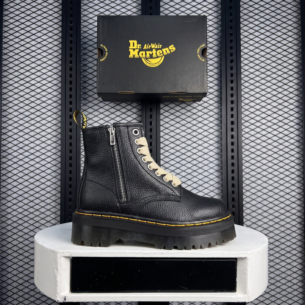 Textured leather boot in black on a platform sole