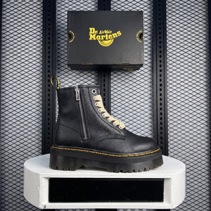 Textured leather boot in black on a platform sole