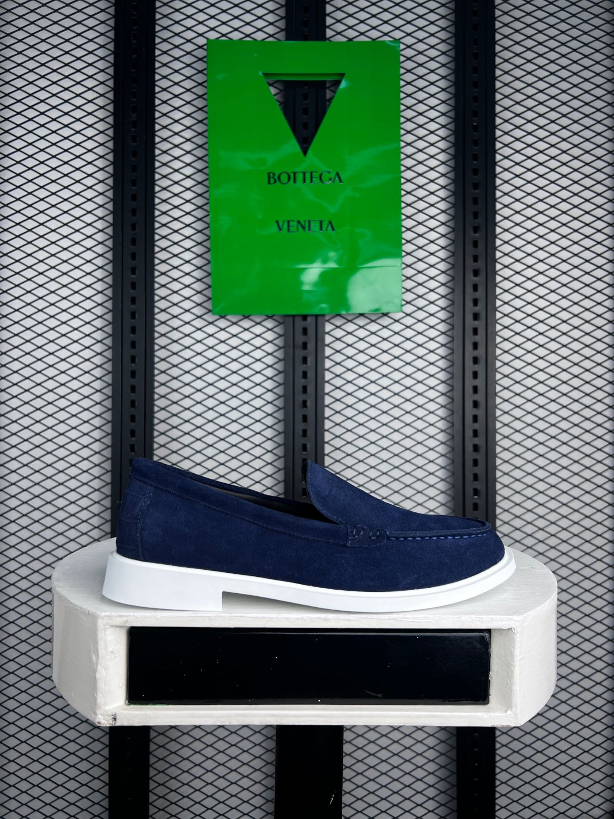 Napped navy slip-on loafer with white cupsole