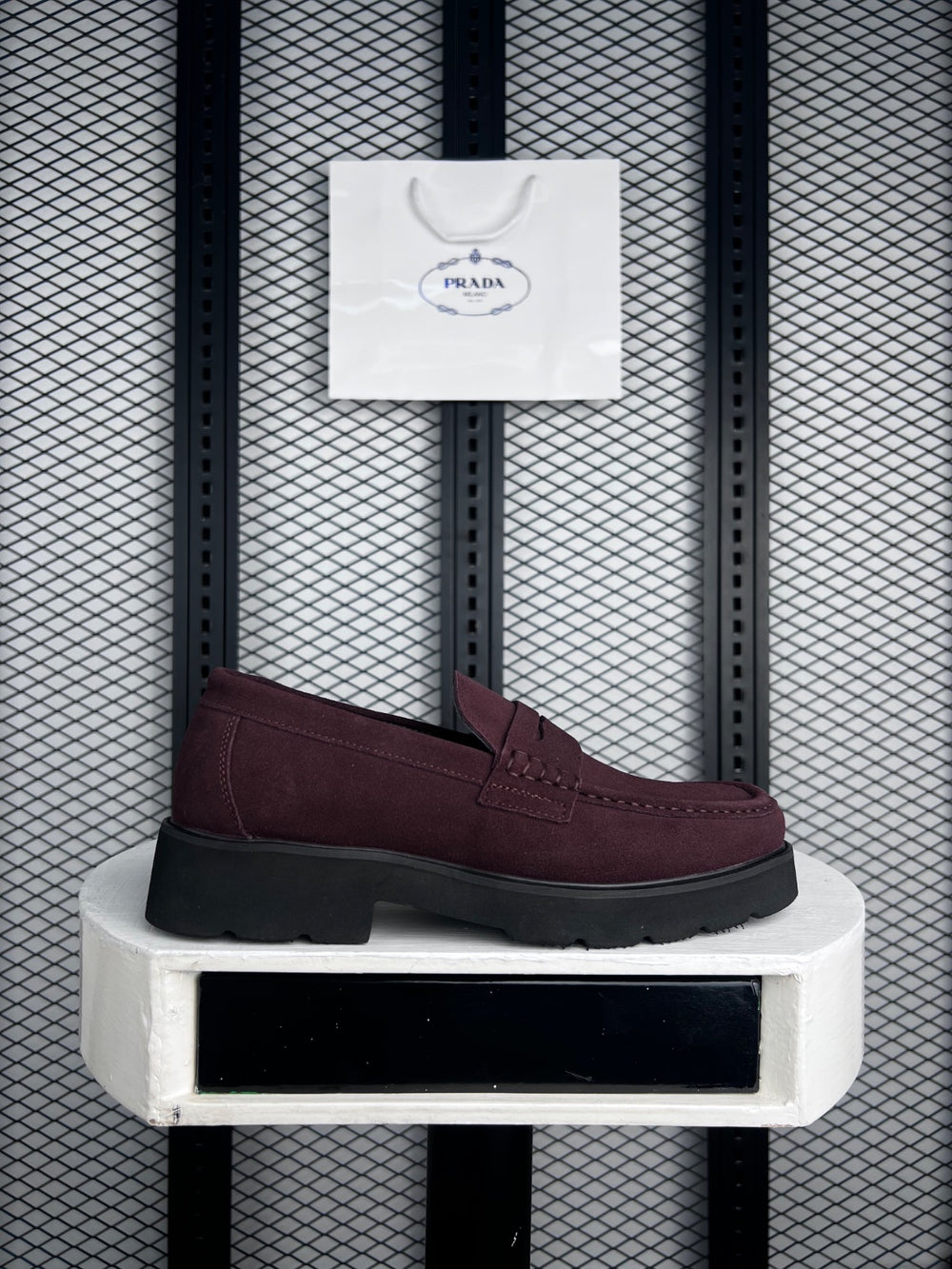 Faux-nubuck penny slip-on with chunky lug sole in brown