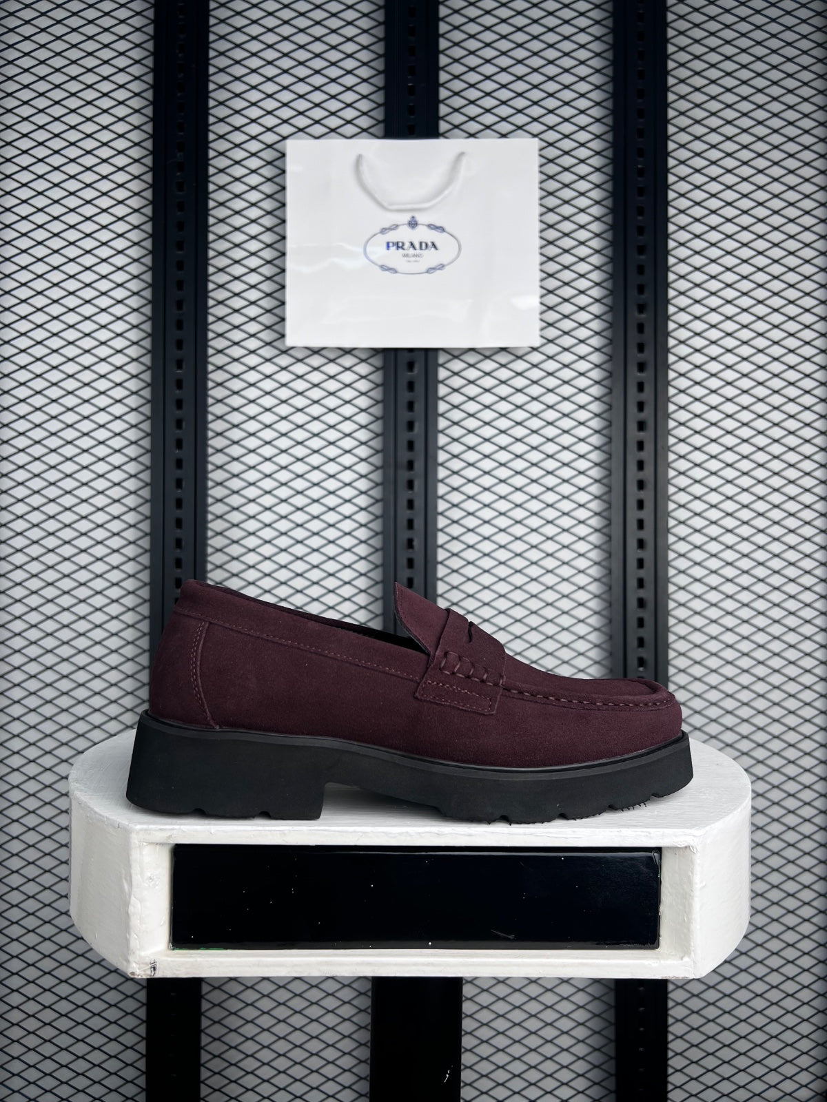 Faux-nubuck penny slip-on with chunky lug sole in brown