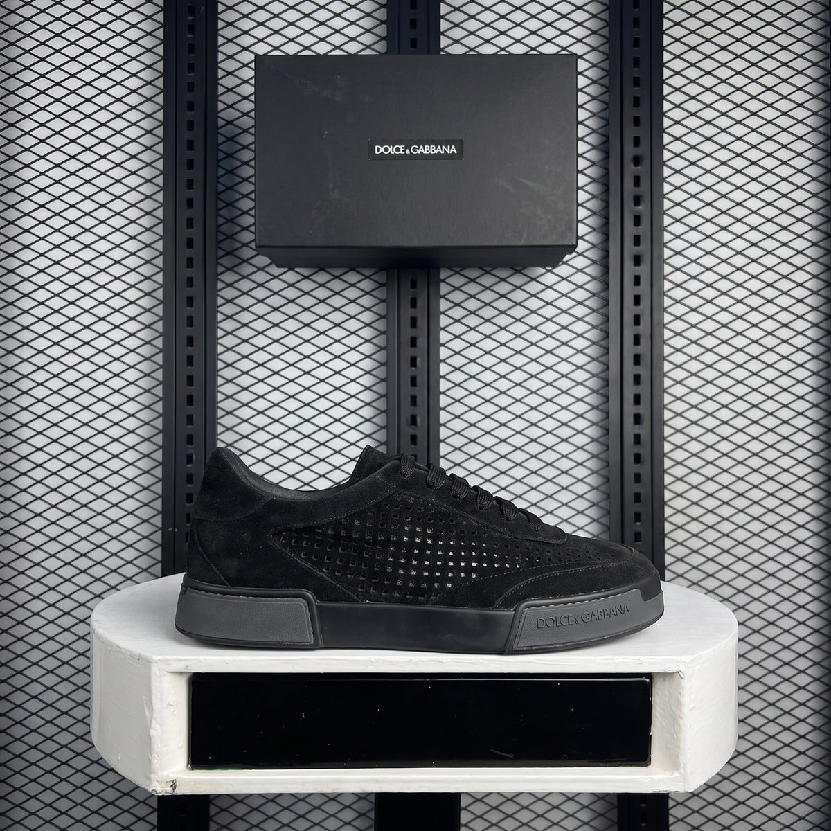 Perforated nubuck low-top trainer in solid black