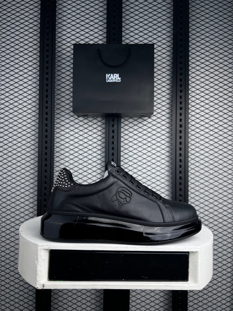 Leather low-top with studded heel and glossy platform
