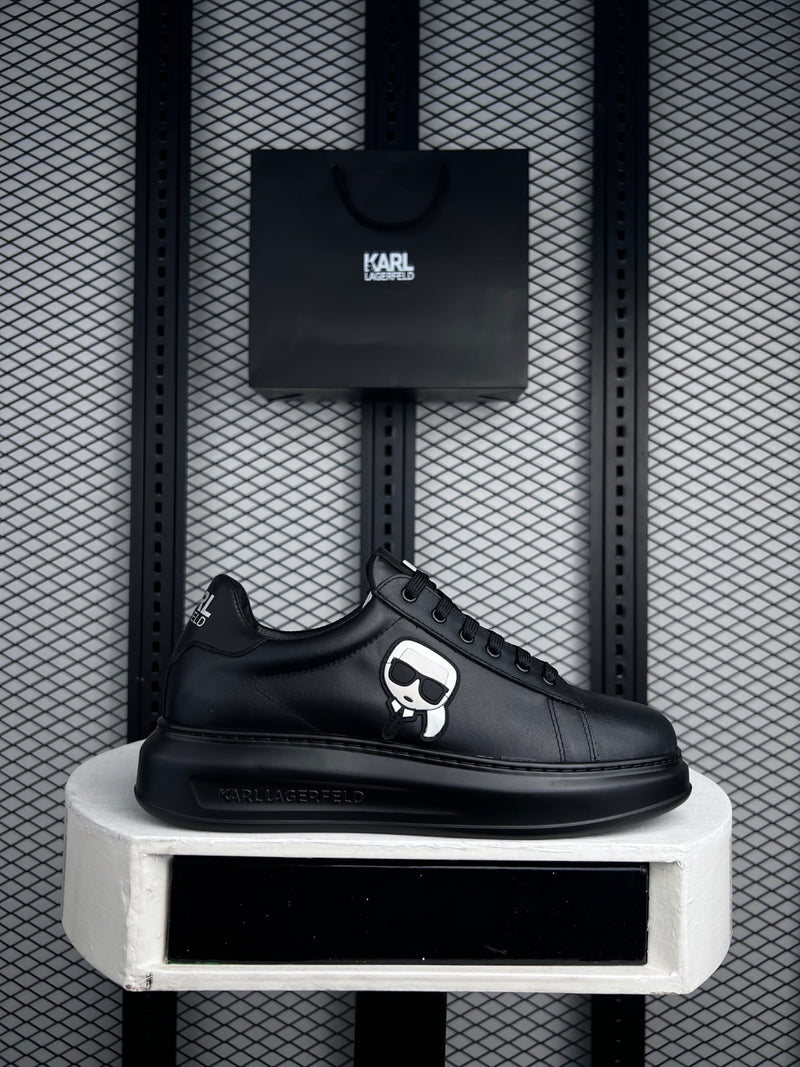 Graphic patch platform leather sneakers in black