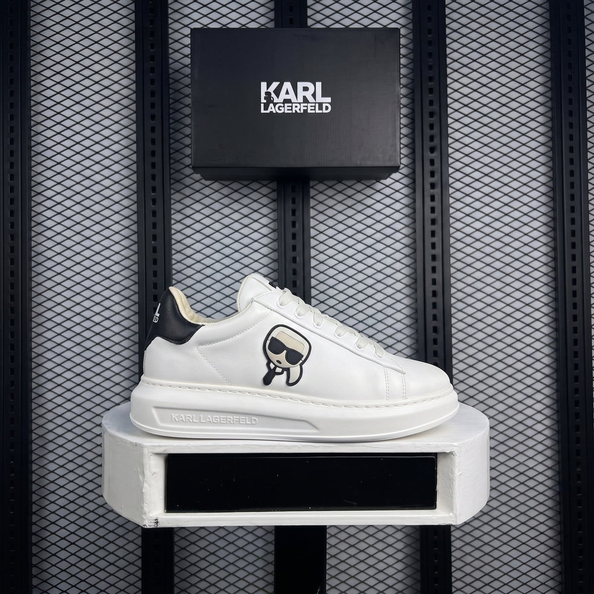 Smooth white leather platform sneaker with black heel tab