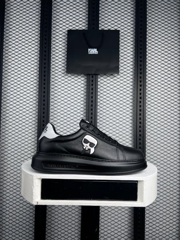 Graphic patch platform leather sneaker in black