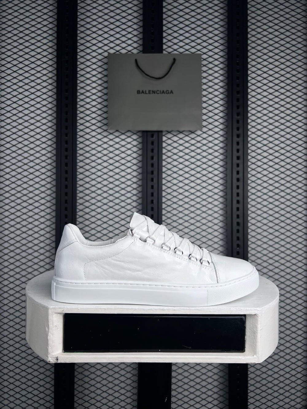 Cup-sole low sneaker in glossy crinkled white leather