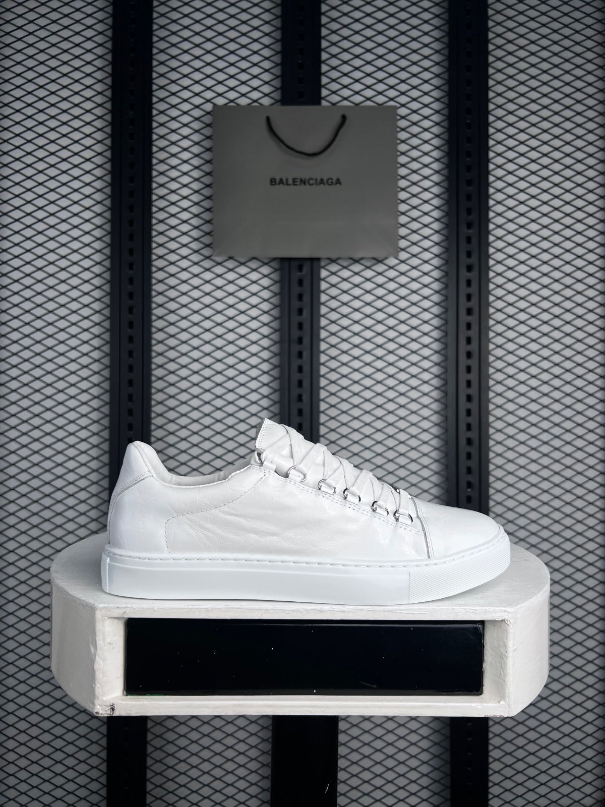 Cup-sole low sneaker in glossy crinkled white leather