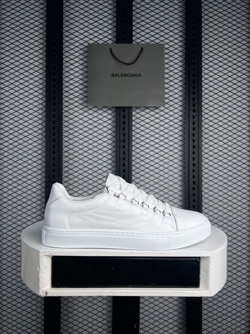 Cup-sole low sneaker in glossy crinkled white leather